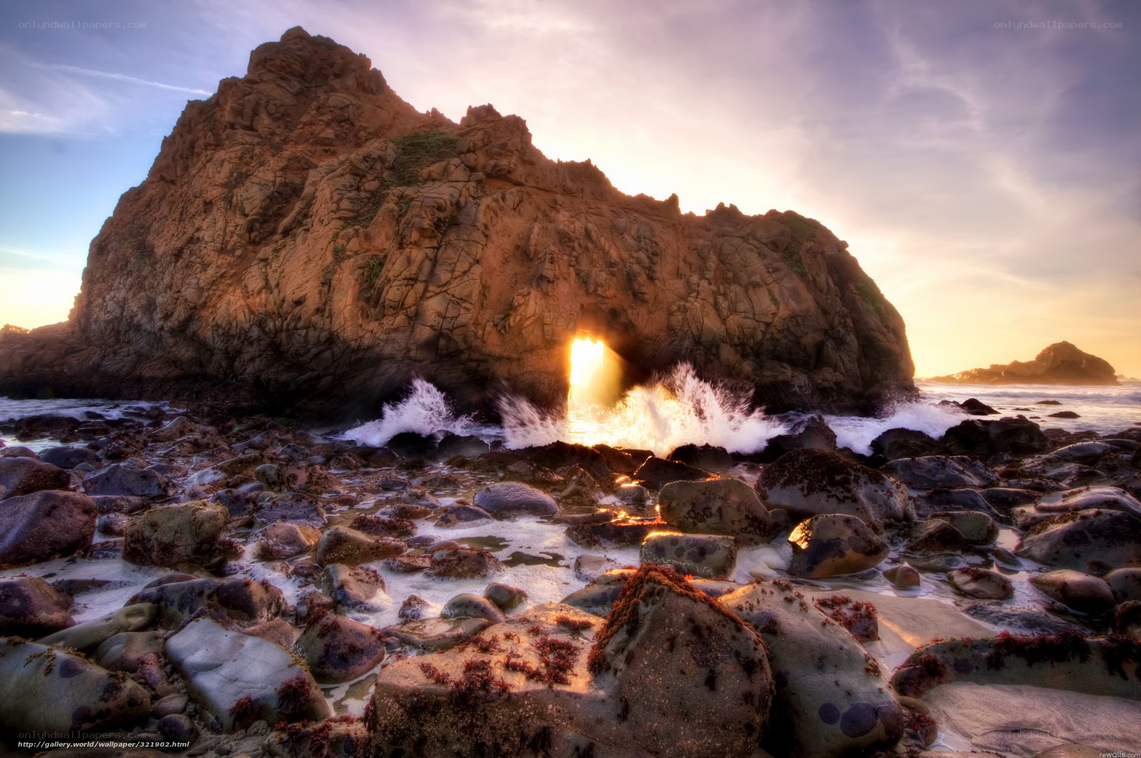 Sunset through sea cave