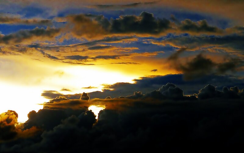 Sunset through storm clouds
