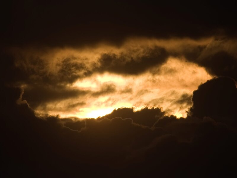 Sunset through storm clouds