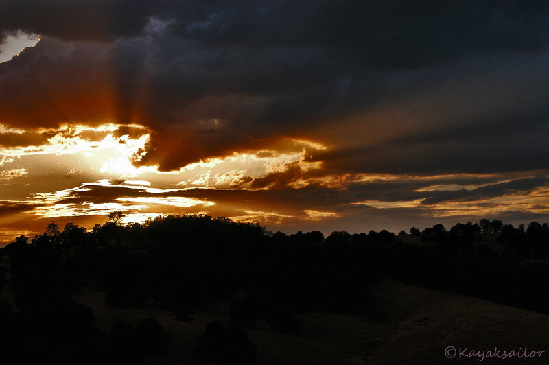 Sunset through storm clouds