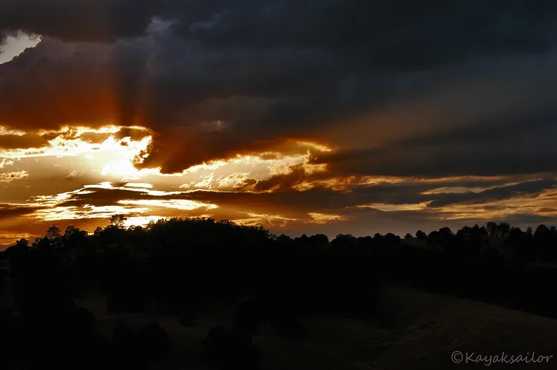 Sunset through storm clouds