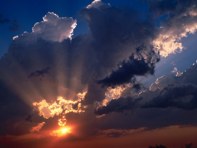 Sunset through storm clouds