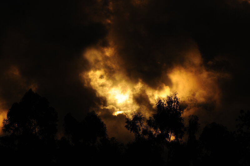 Sunset through storm clouds