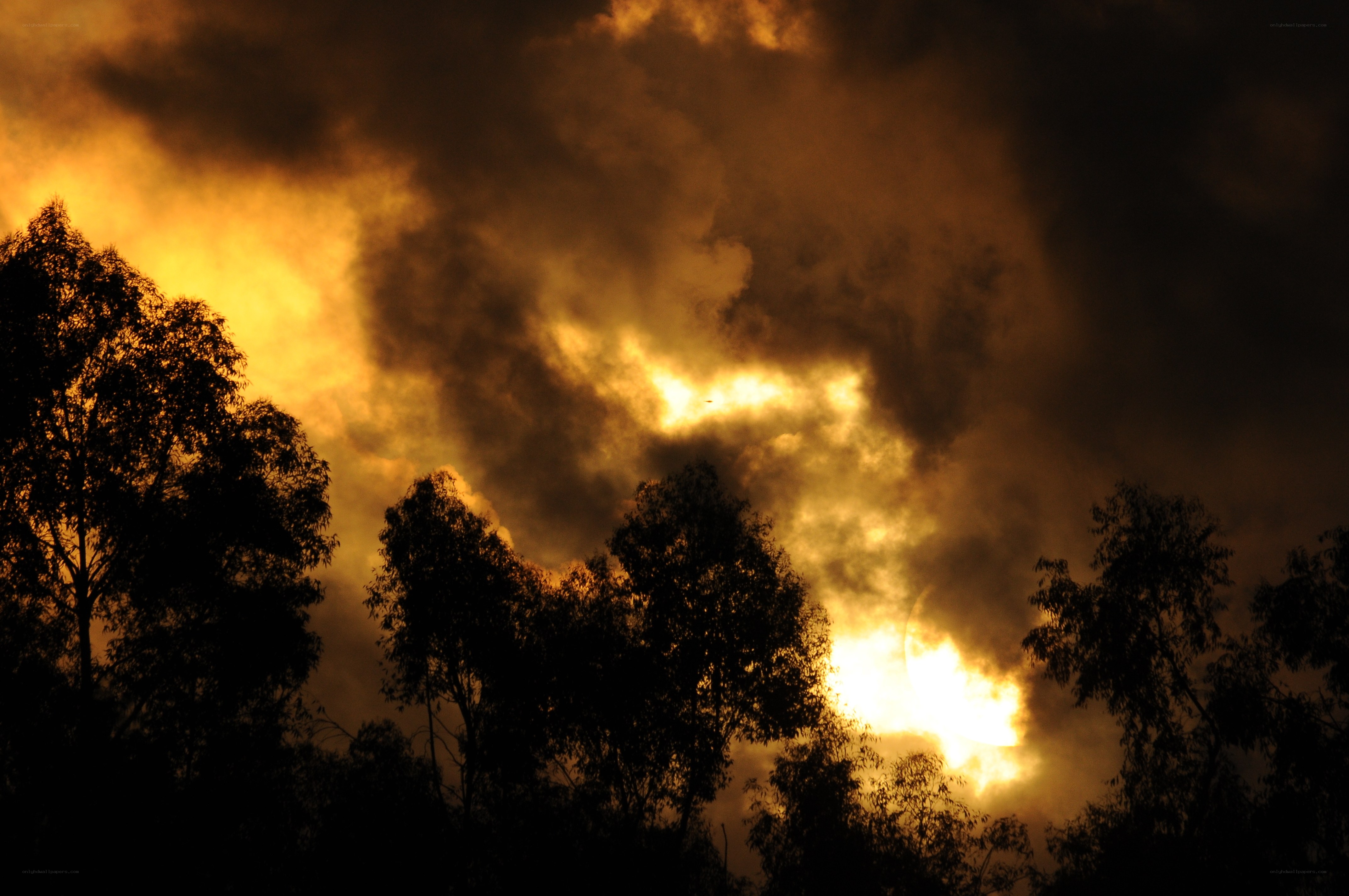 Sunset through stormy clouds