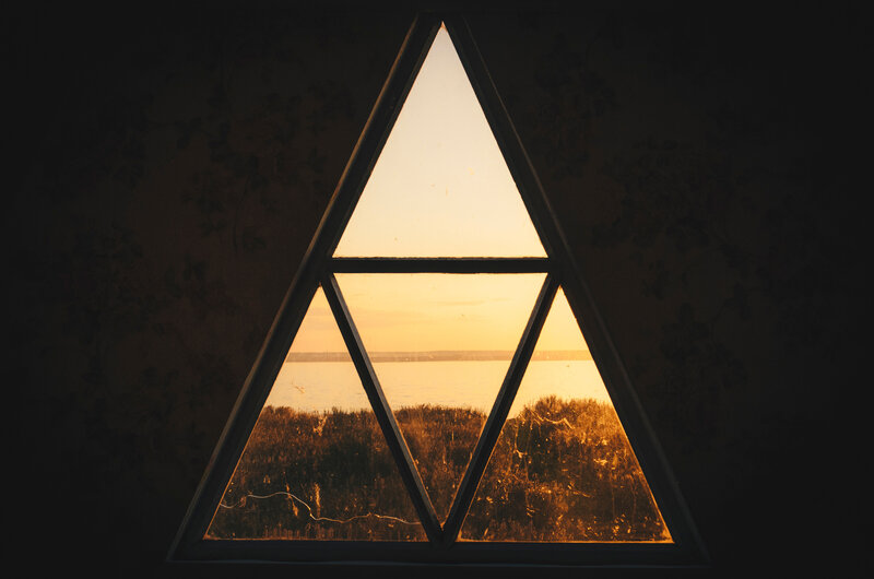 Sunset Through Triangular Window