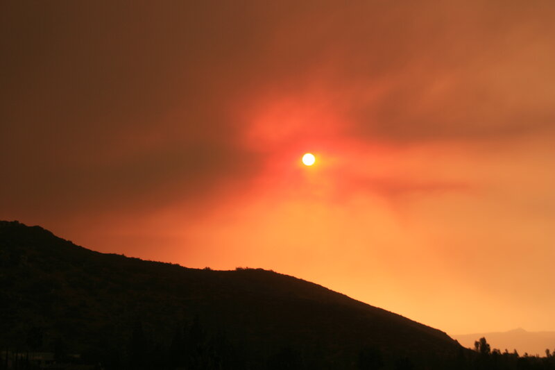 Sunset through wildfire smoke