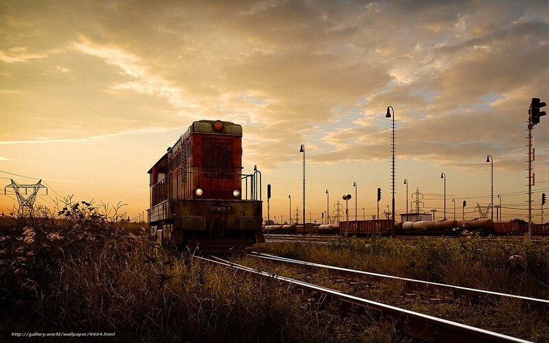 Sunset train at railway yard