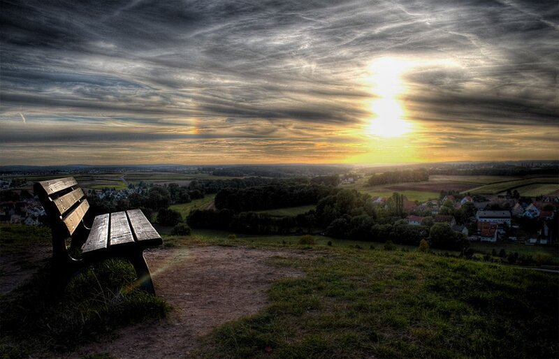 Sunset view from a hilltop bench
