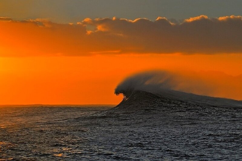 Sunset wave at sea