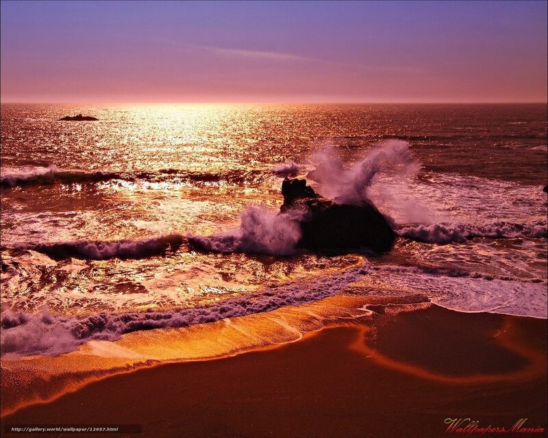 Sunset waves crashing on rocks
