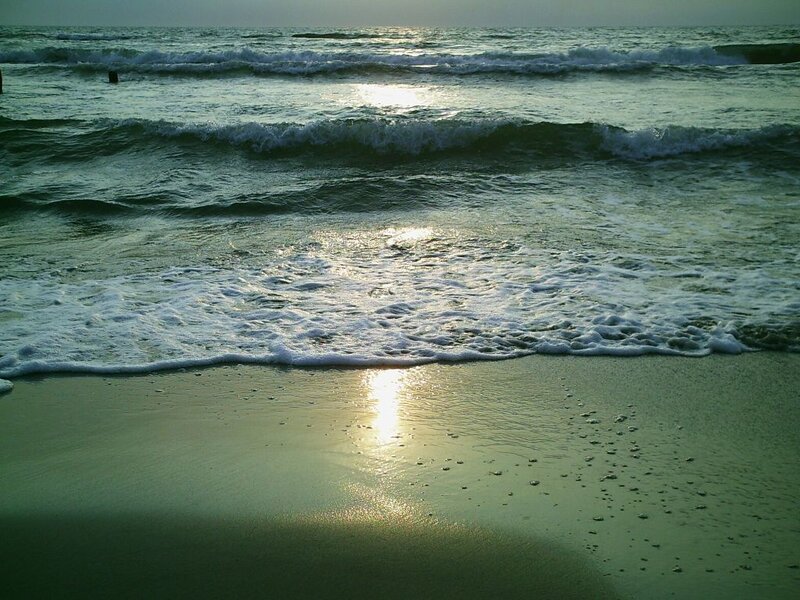 Sunset waves on the beach