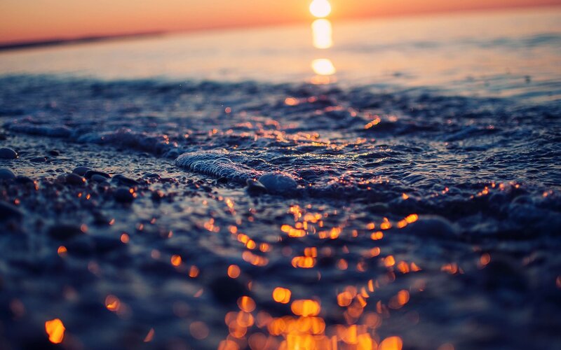 Sunset waves on the shore
