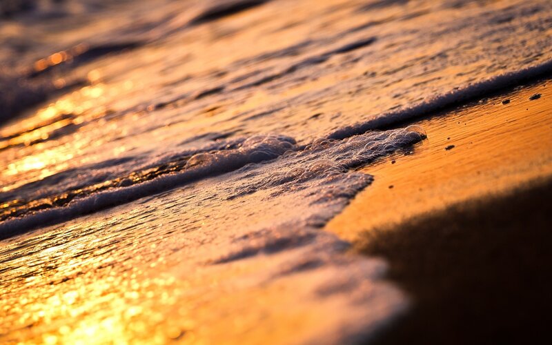 Sunset waves on the shore