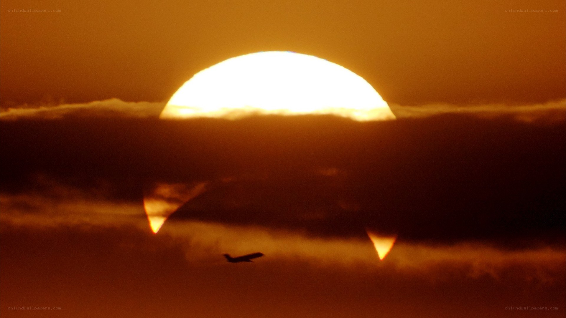 Sunset with airplane silhouette