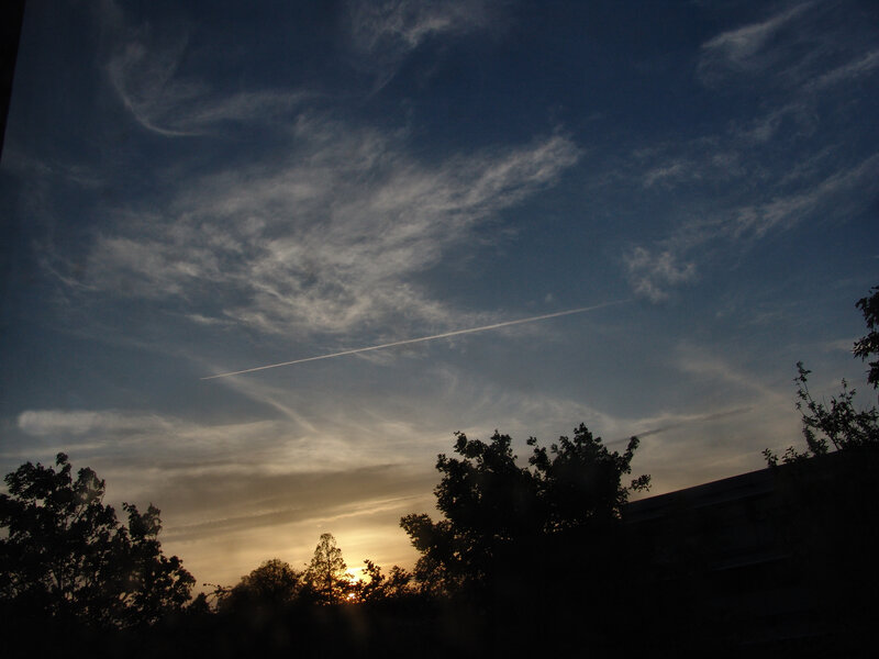 Sunset with Airplane Trail — Blue
