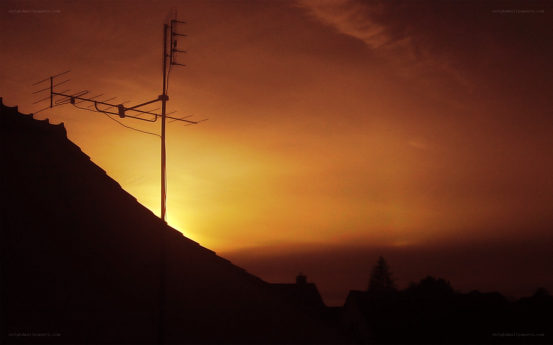 Sunset with antenna silhouette