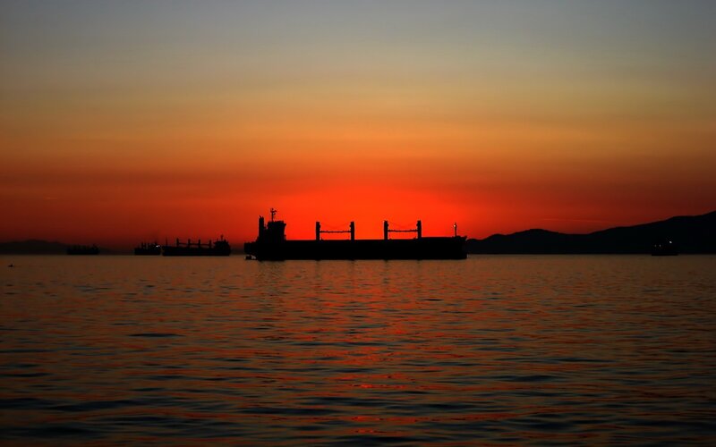Sunset with cargo ships