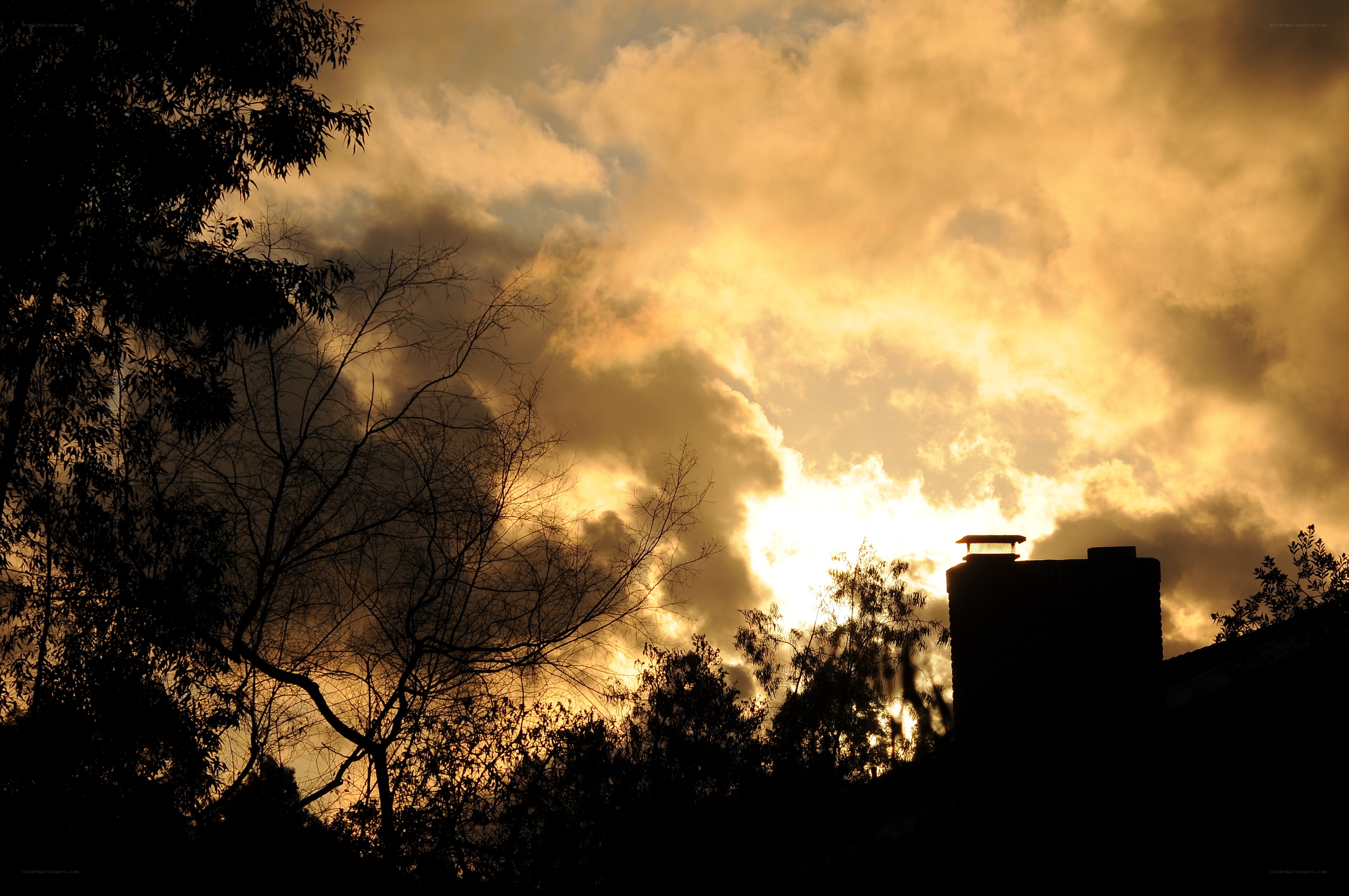 Sunset with chimney silhouette