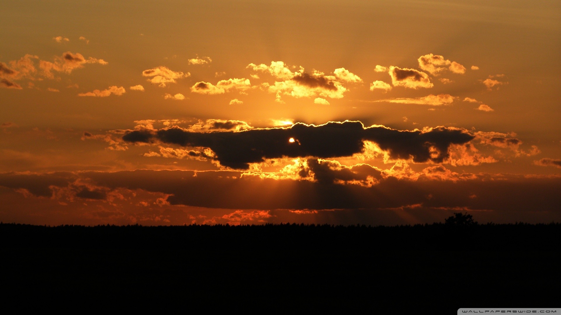Sunset with cloud rays