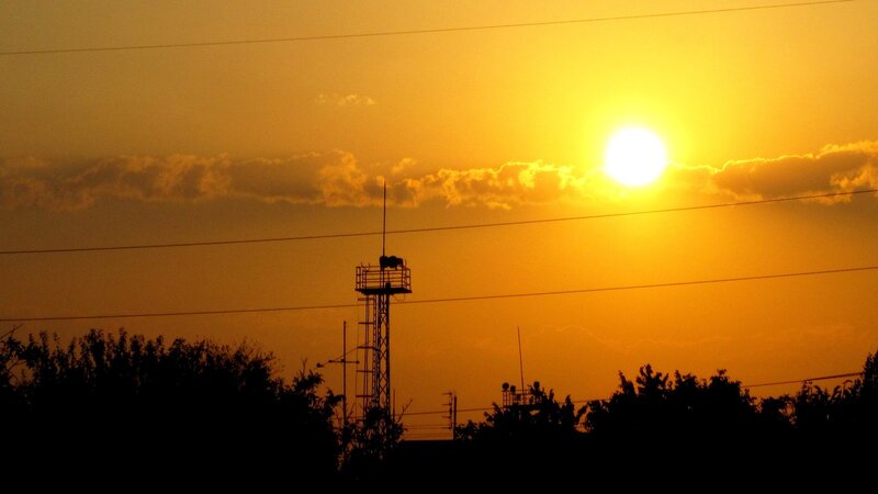 Sunset with communication tower