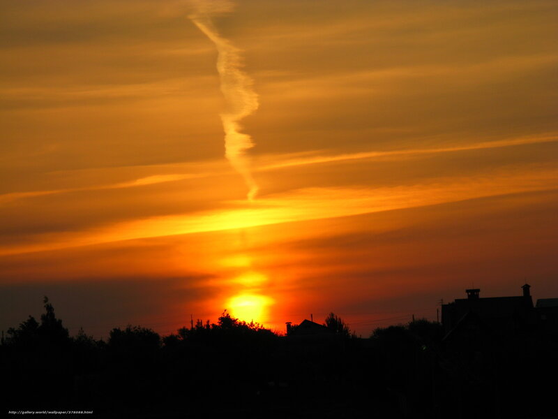 Sunset with contrail