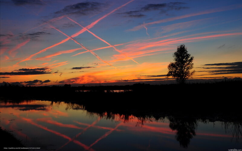 Sunset with contrails