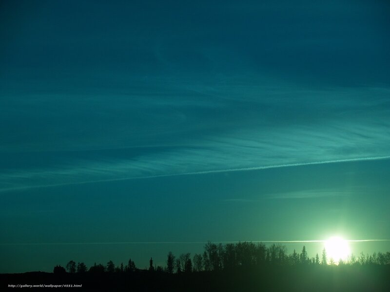 Sunset with contrails