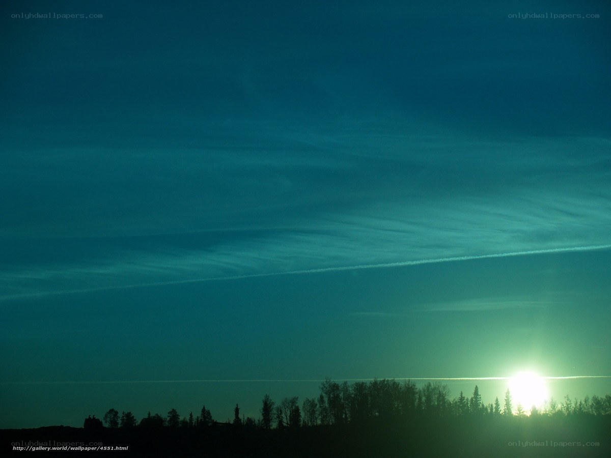 Sunset with contrails
