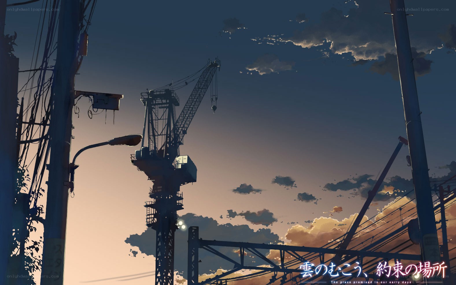 Sunset with crane and power lines