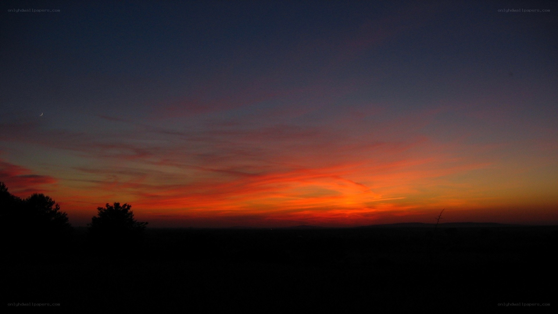 sunset with crescent moon