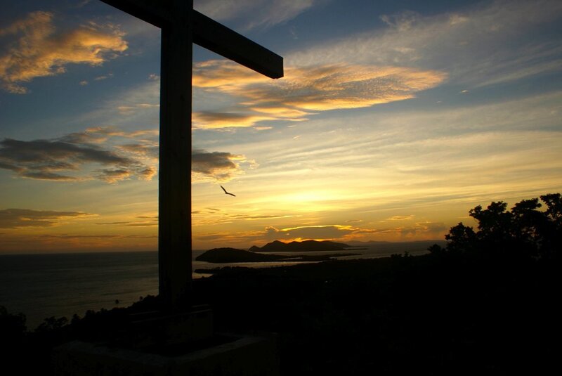 Sunset with cross silhouette