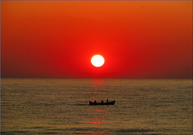 Sunset with fishing boat