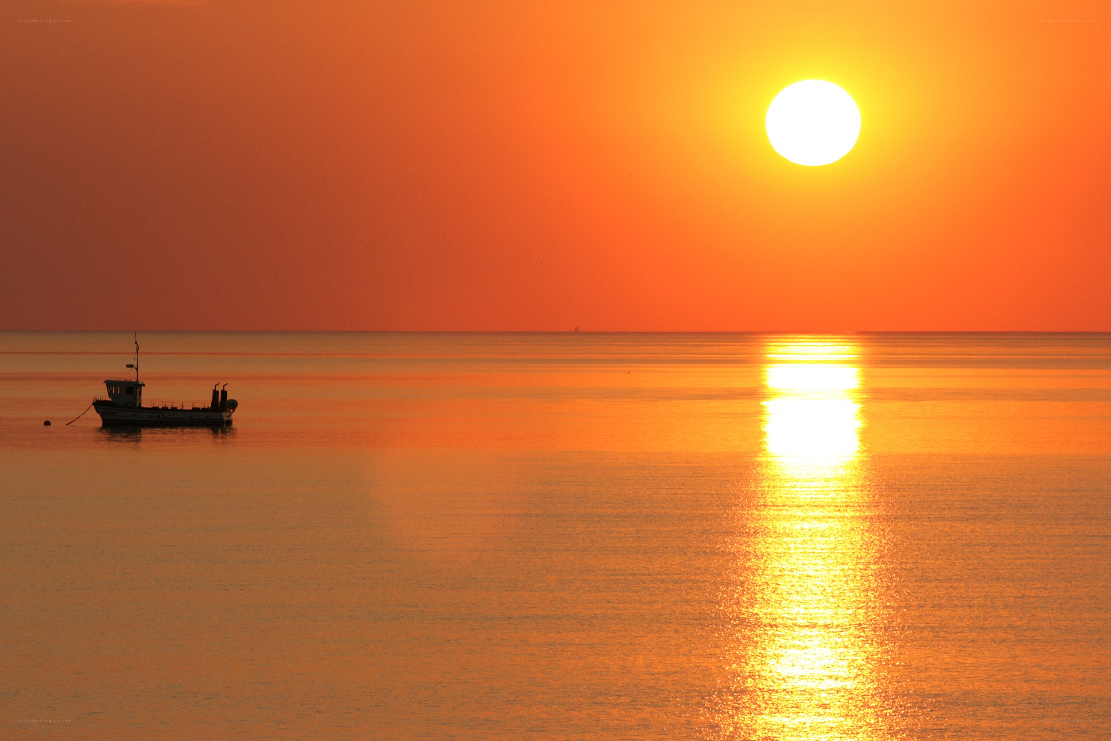 Sunset with fishing boat