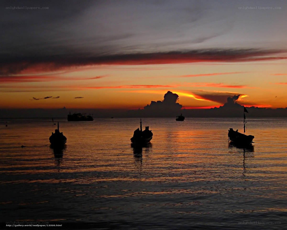 Sunset with fishing boats