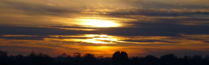 Sunset with golden clouds
