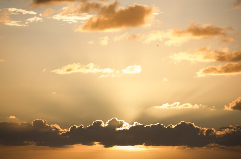 Sunset with golden clouds
