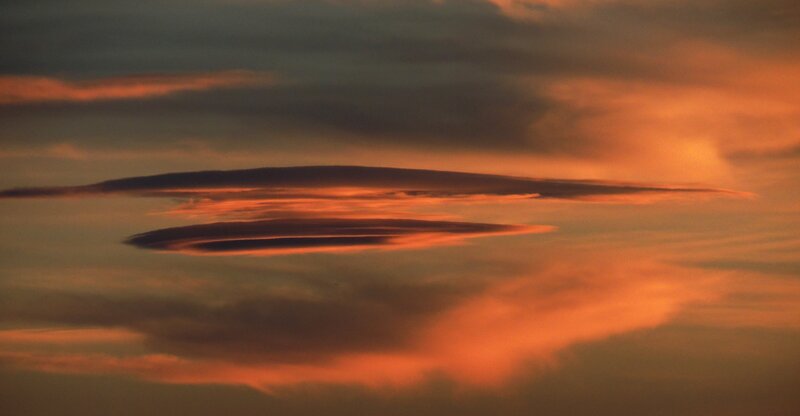 sunset with lens-shaped clouds