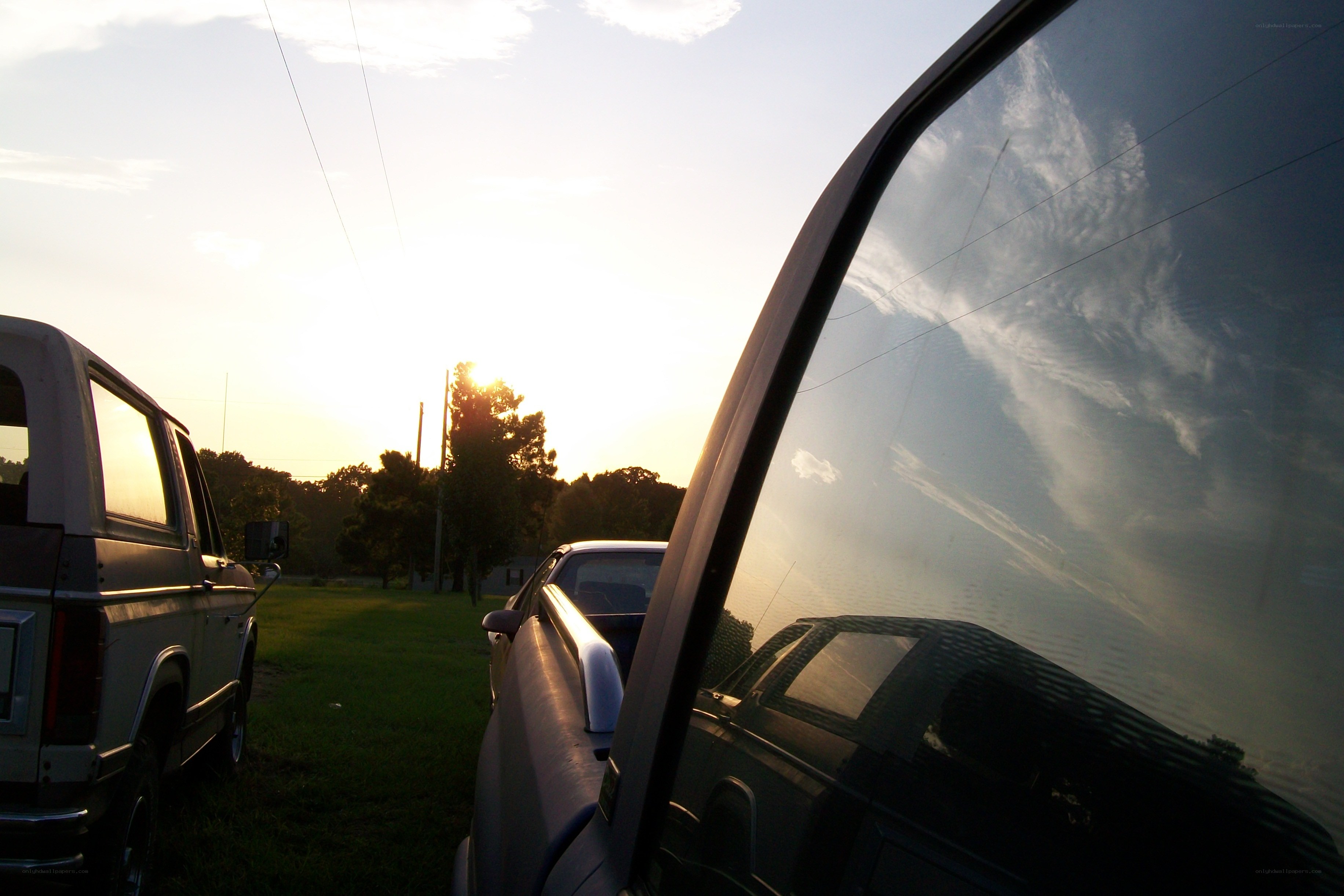 Sunset with parked trucks