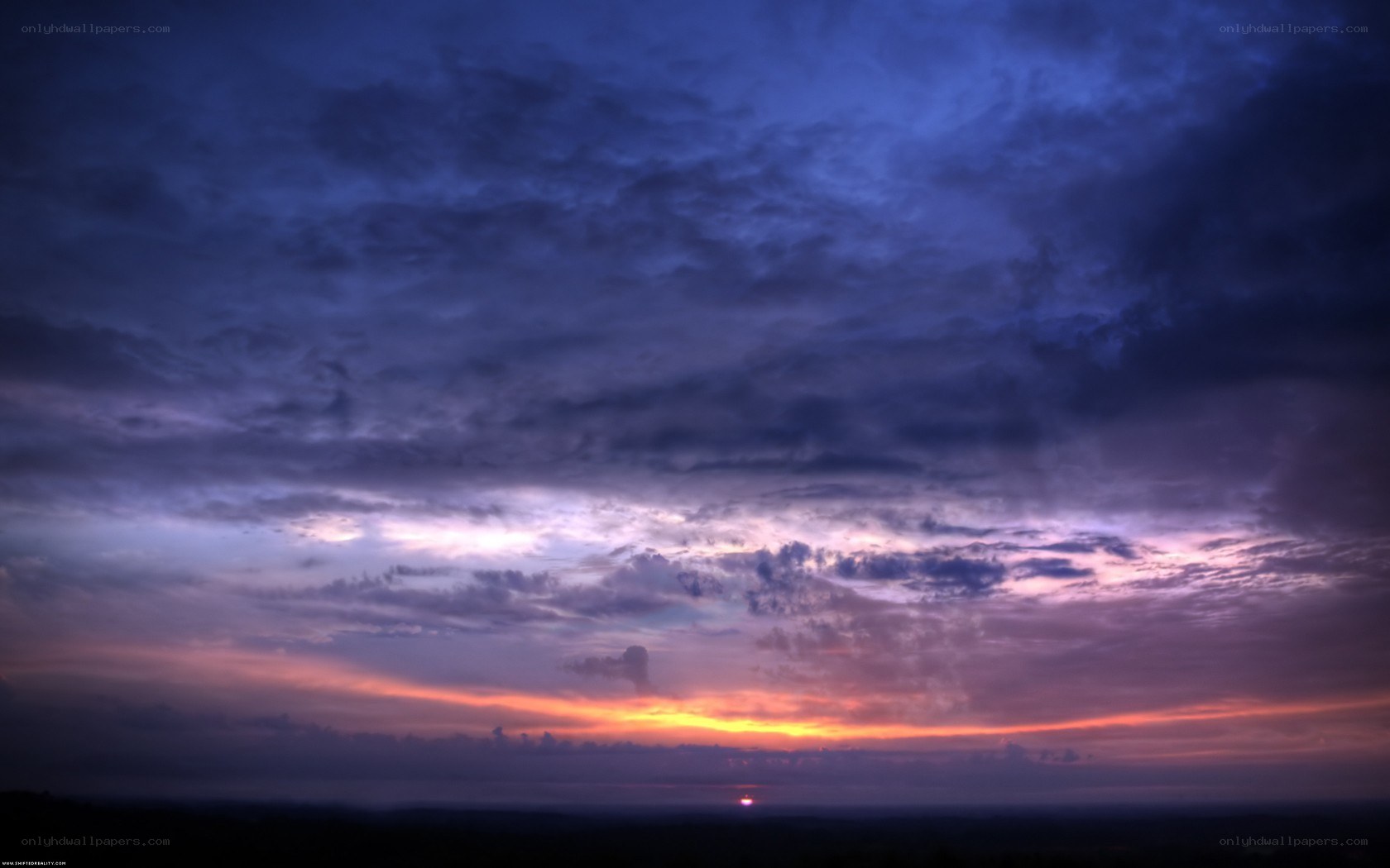 sunset with purple clouds