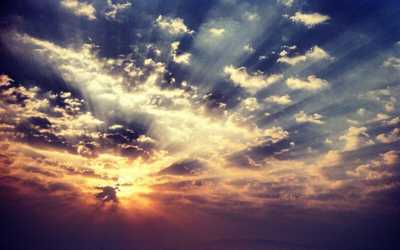 Sunset with radiant clouds