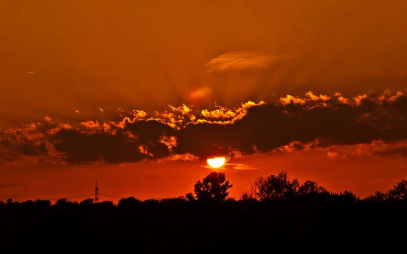 Sunset with radiant clouds