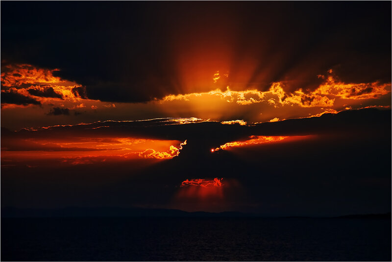 Sunset with radiant clouds