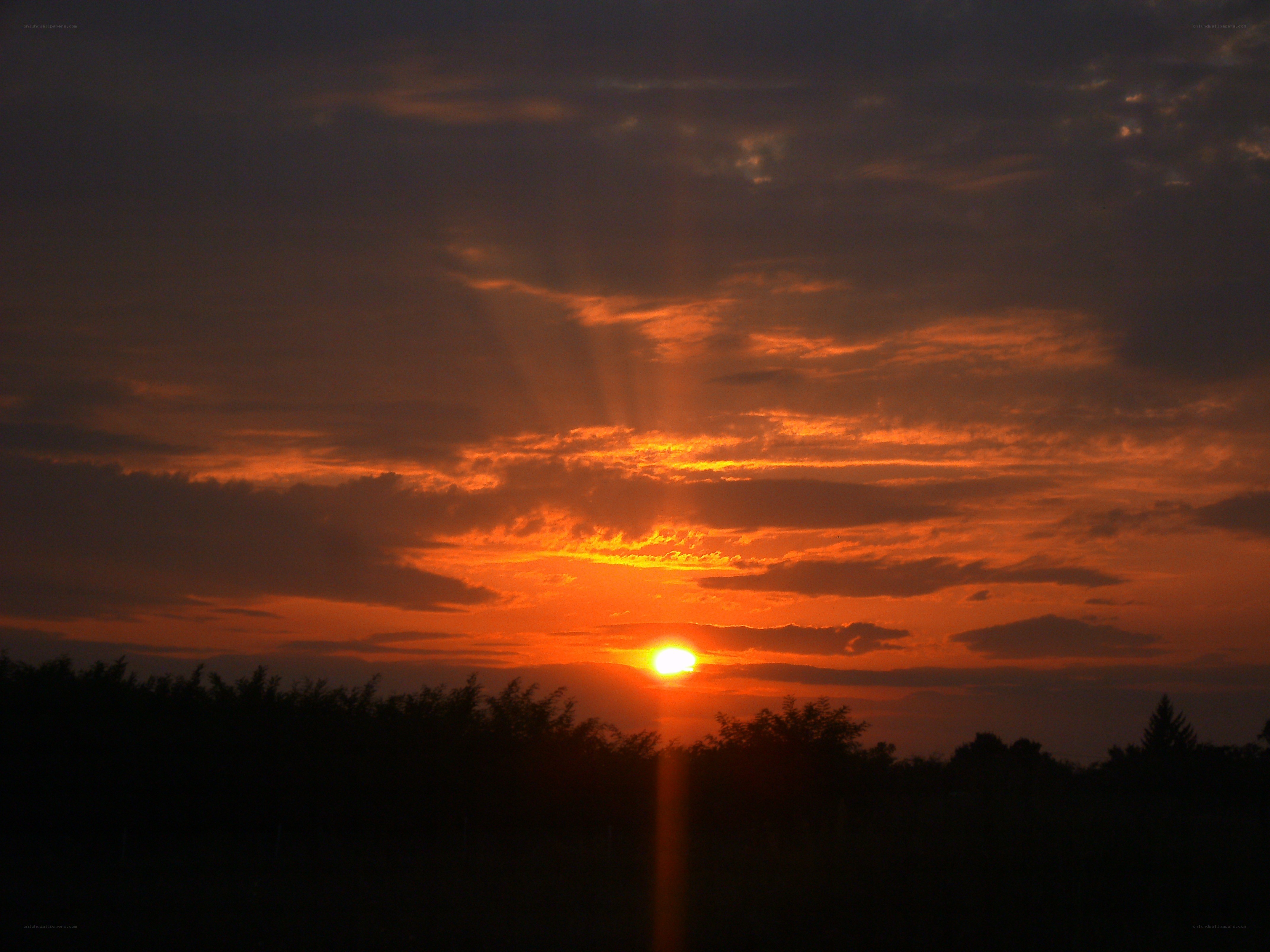 Sunset with radiant clouds