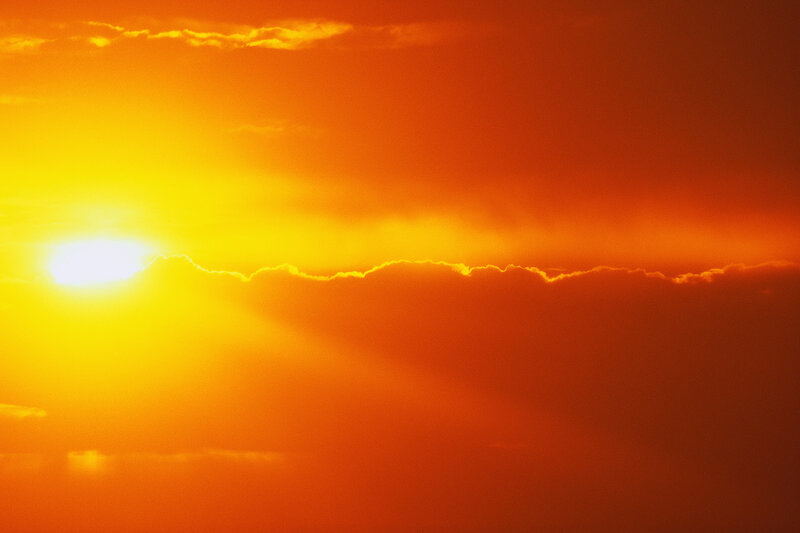 Sunset with radiant sky