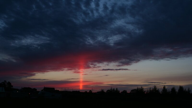 Sunset with red beam