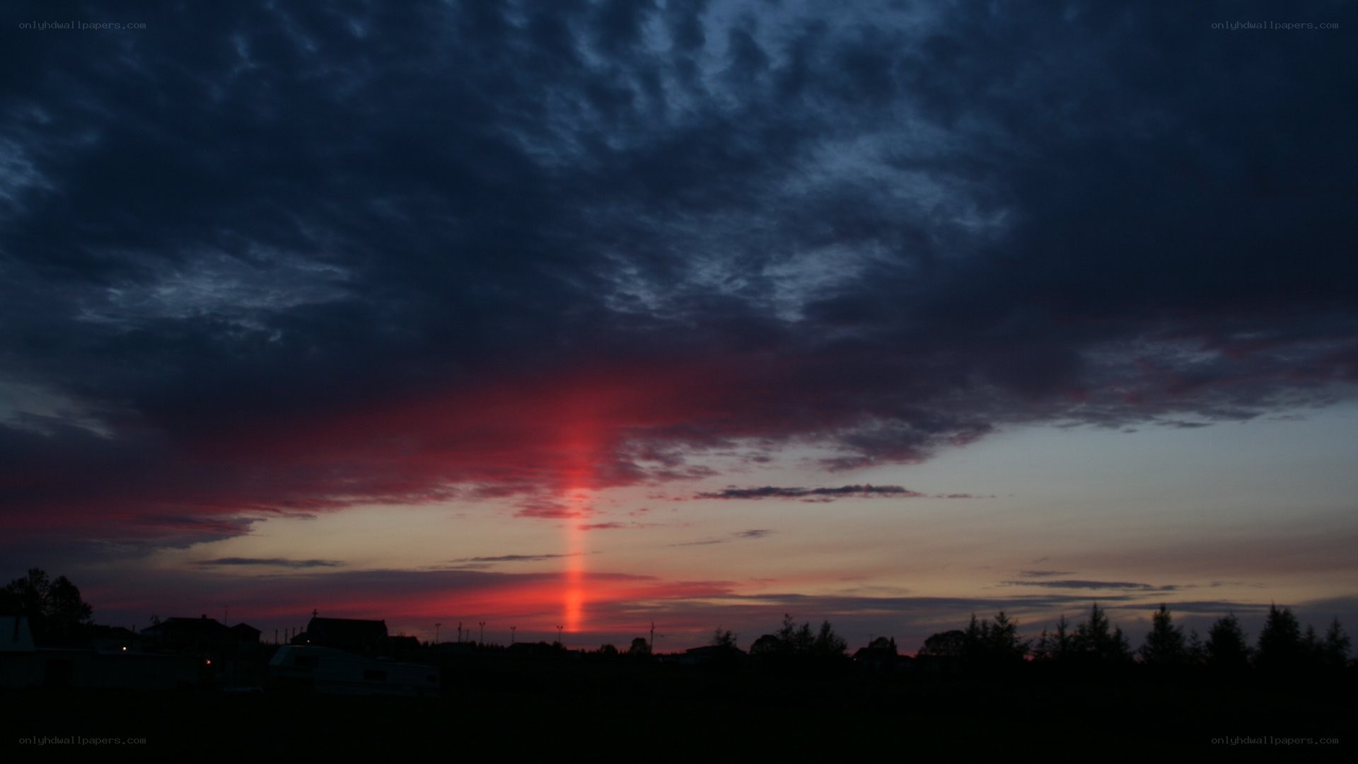 Sunset with red beam