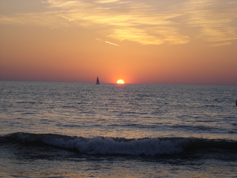 sunset with sailboat