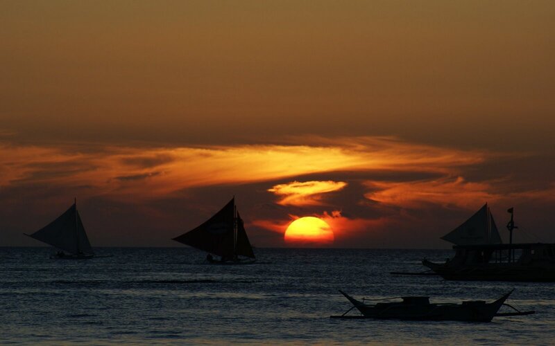 Sunset with sailboats