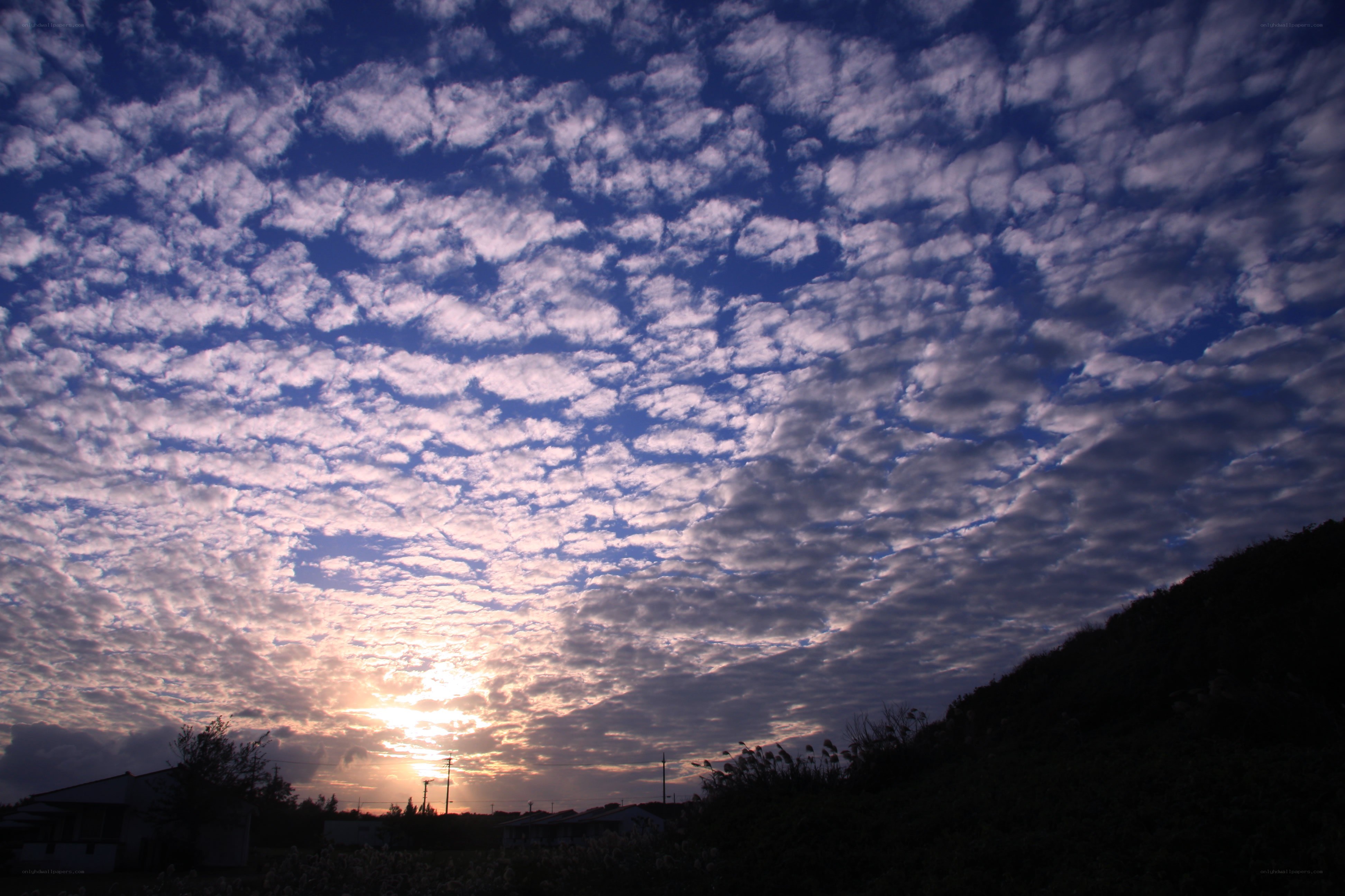 Sunset with scattered clouds