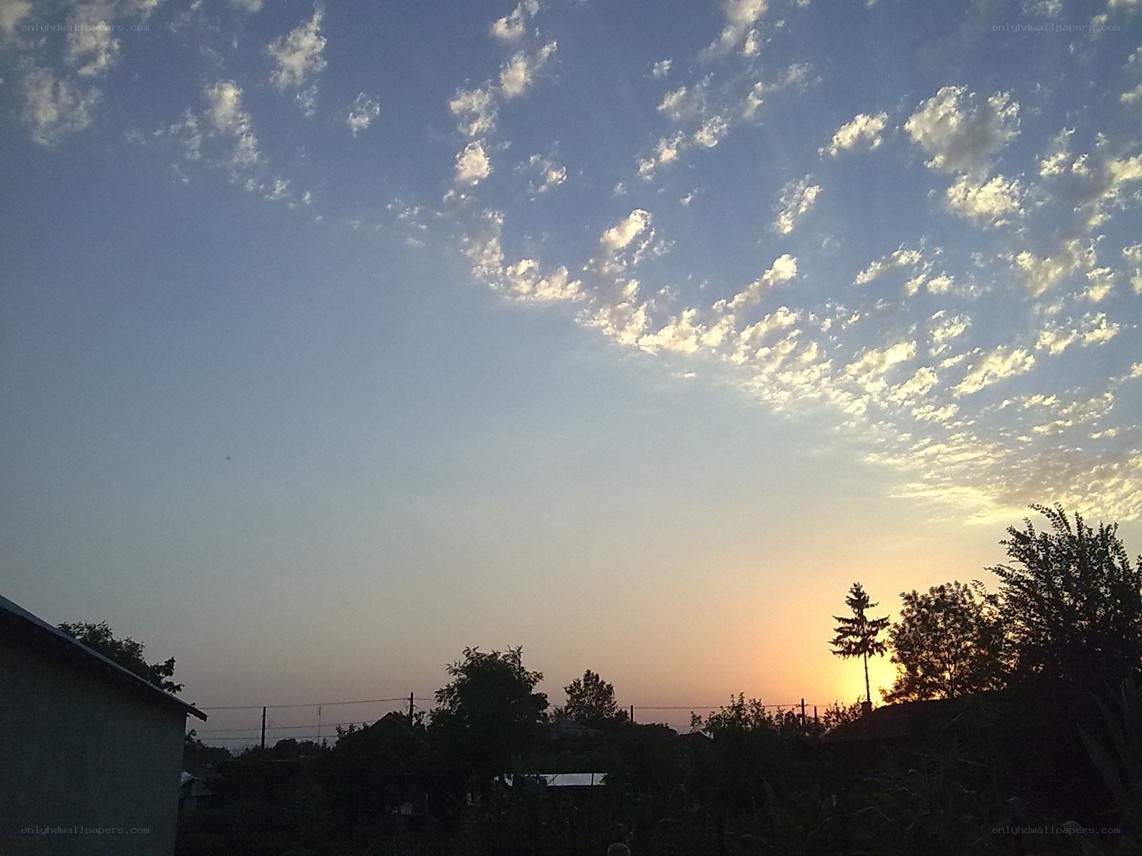 sunset with scattered clouds